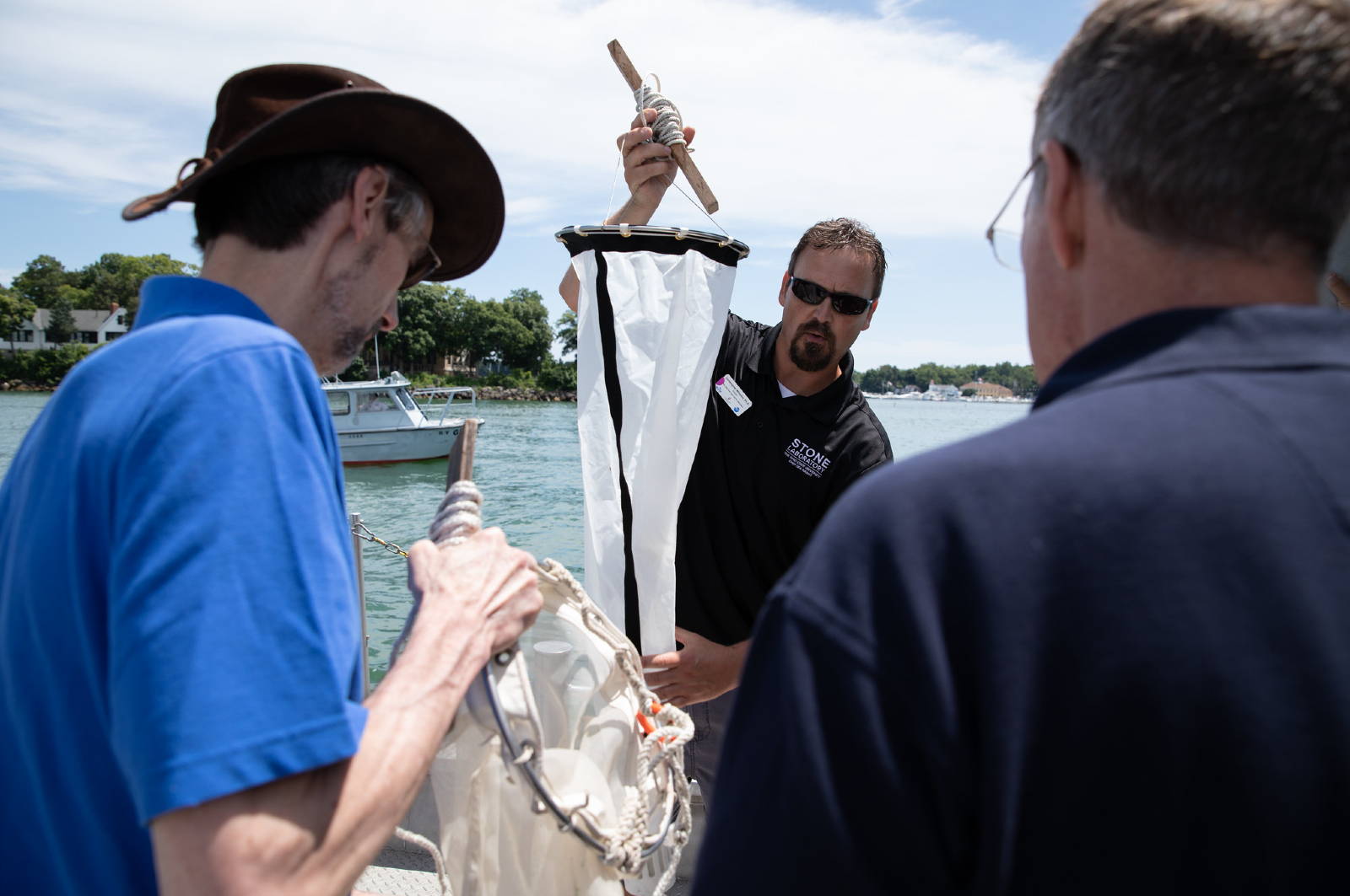 Chris Winslow preparing a zooplankton net for a tow