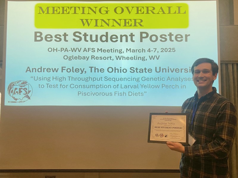 Andrew Foley and his best overall student poster award