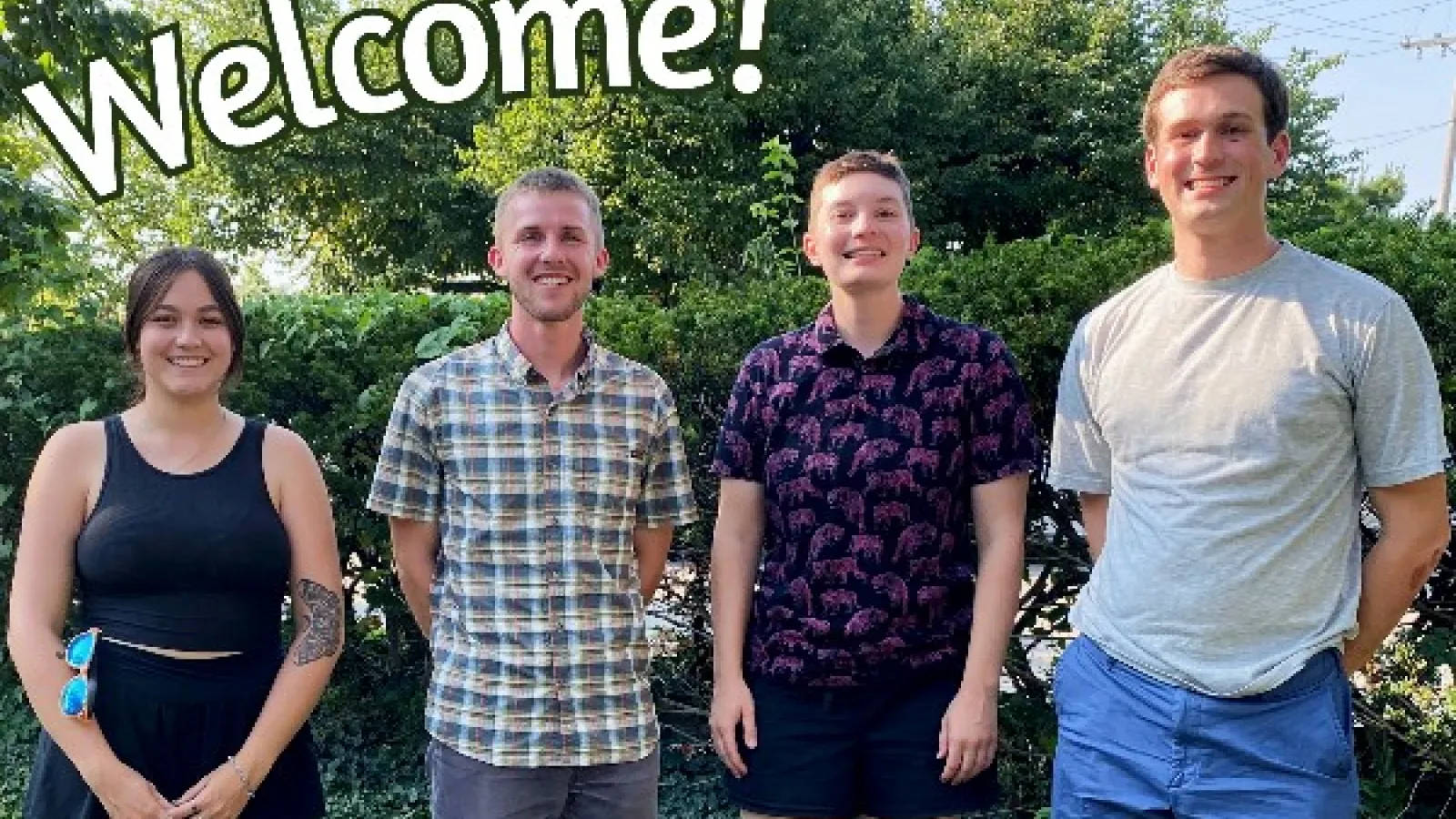 Welcome group photo of Abigail, Justin, Madeline, and Andrew