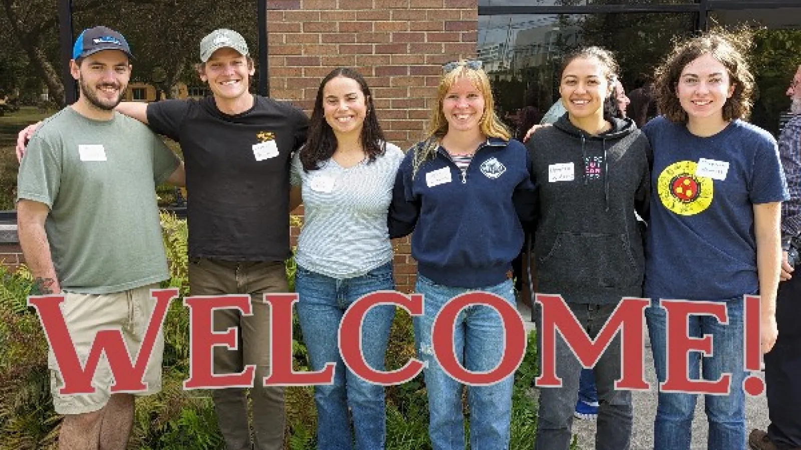 Group photo of Seth Drake, James Dowling, Grace Watson, Megan Herbruck, Demetra Williams, and Meredith Bennett with text "Welcome" 