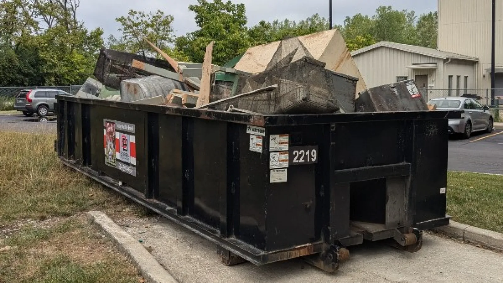 overfilled dumpster