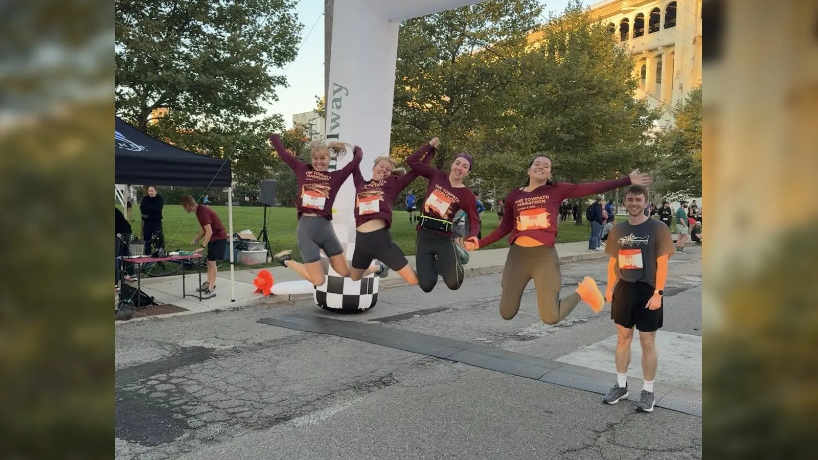 Megan, Sarah, Vanessa, Meredith and Justin celebrating after the race