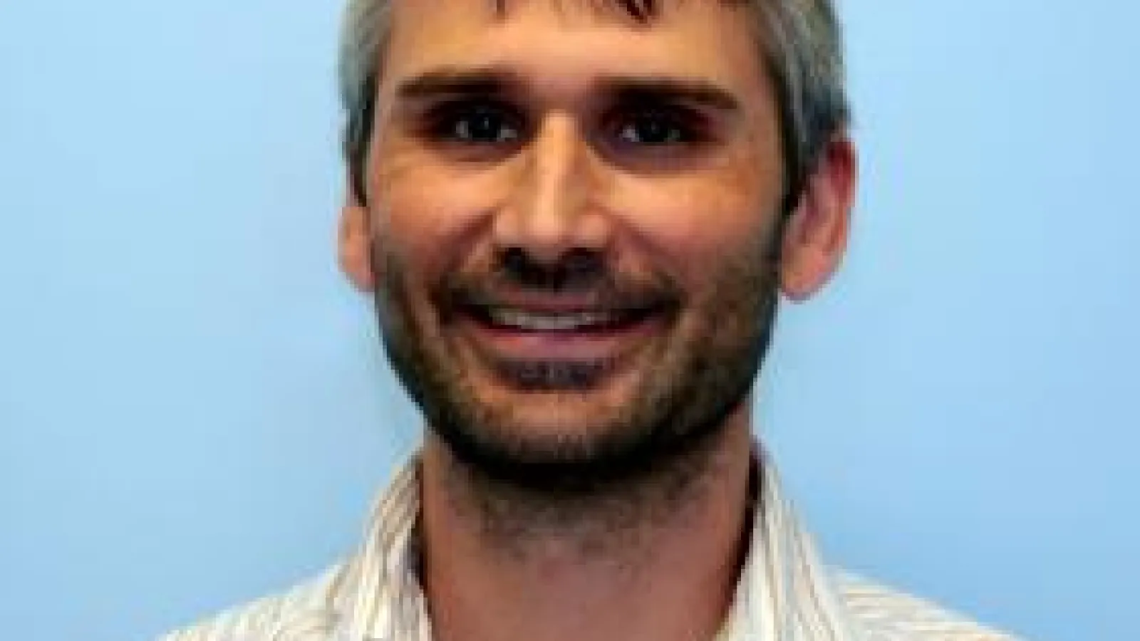 Headshot of Jahn Kallis