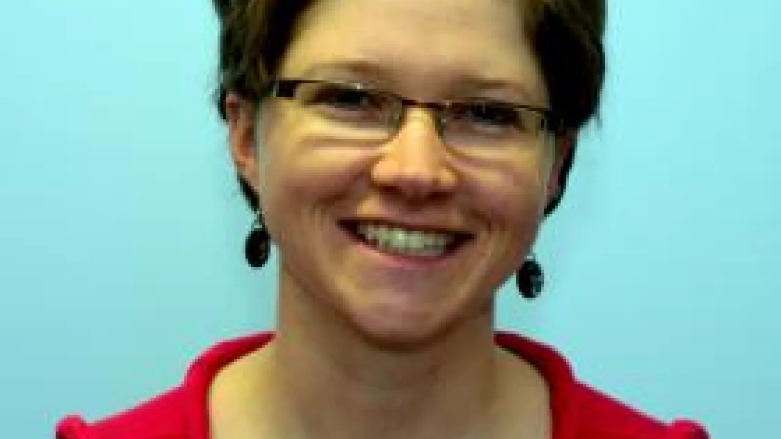 Headshot of Cassie May