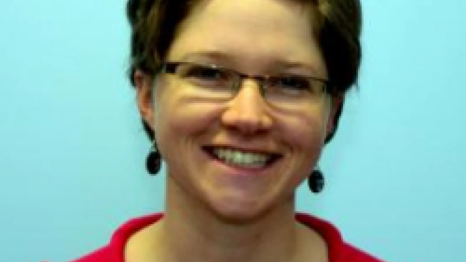 Headshot of Cassie May