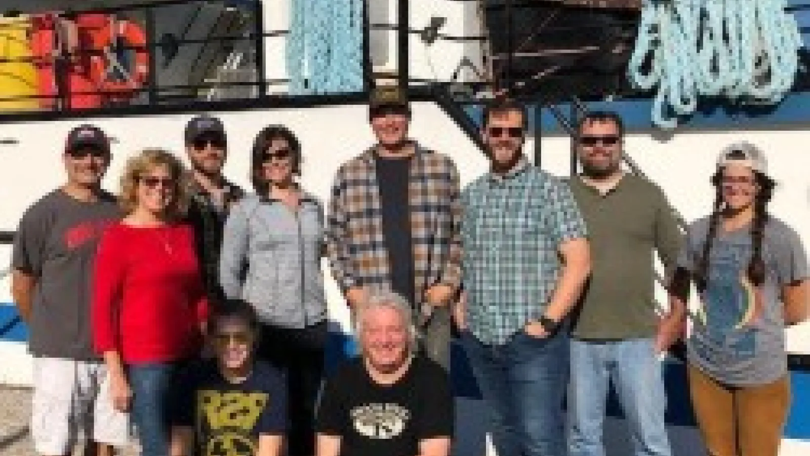 Group photo including Dr. Ludsin in front of the sampling vessel.