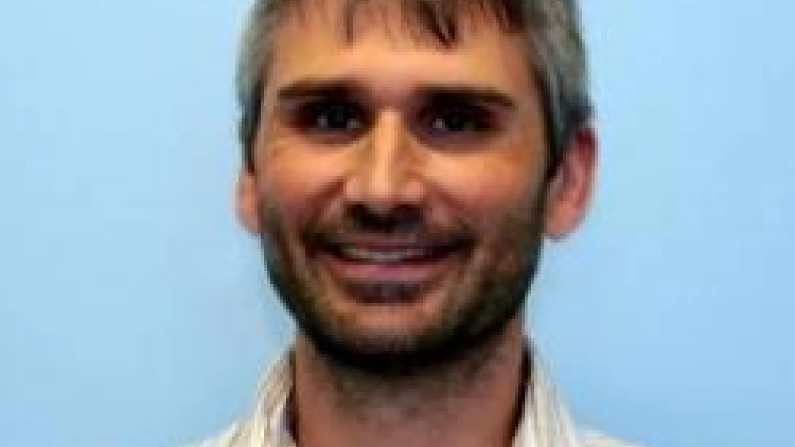 Headshot of Jahn Kallis