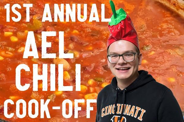 Text: 1st Annual AEL Chili Cook-off; photo of Jacob Bentley with a background of a pot of chili