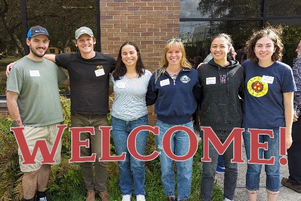 Group photo of Seth Drake, James Dowling, Grace Watson, Megan Herbruck, Demetra Williams, and Meredith Bennett with text "Welcome" 