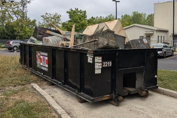 overfilled dumpster