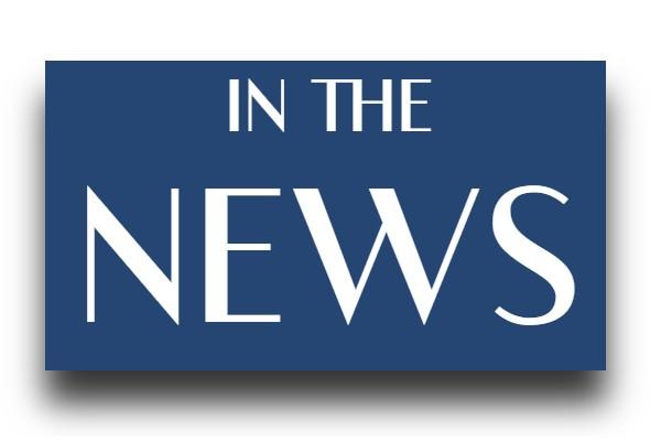 white text over a blue background, text reads: "In the news"