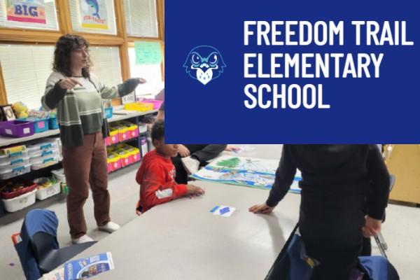 Haley Miller presenting to classroom of students