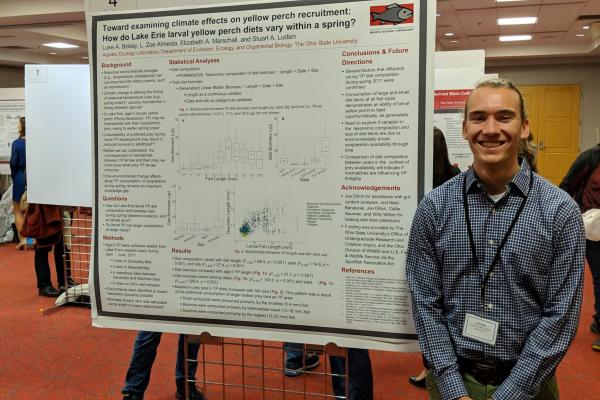 AEL undergraduate researcher Luke Bobay and his poster AEL undergraduate researcher Luke Bobay and his poster