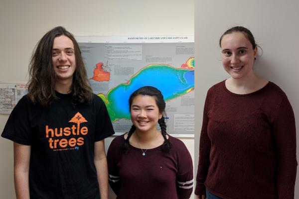 High school researchers Ben (left) and Michalea (center) and Post-doctoral researcher Andrea (right)