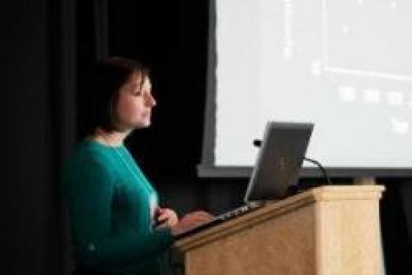 Ruth Briland presents at a conference