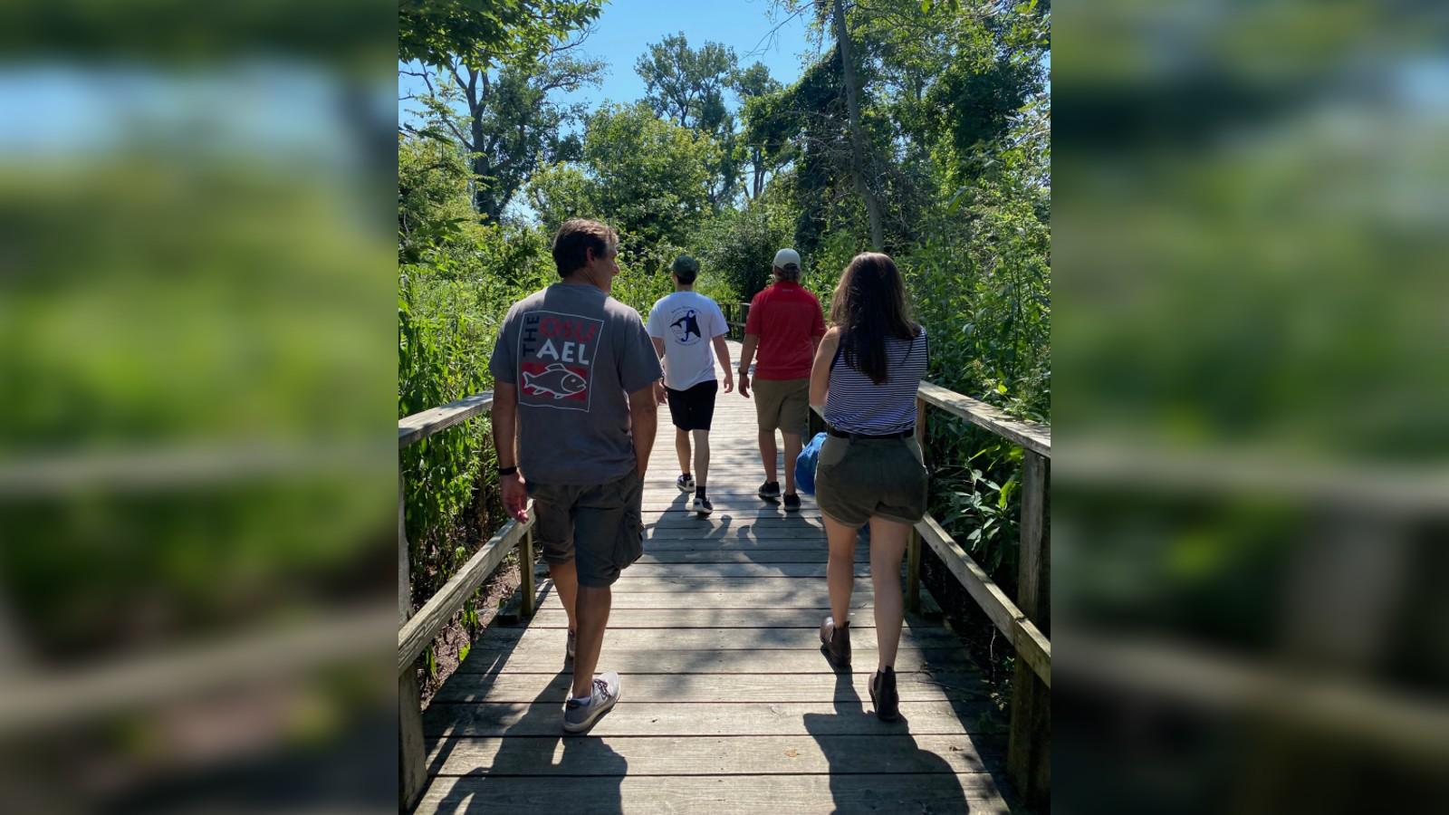 Stu Ludsin and Addie Almeda on the boardwalk at Magee Marsh