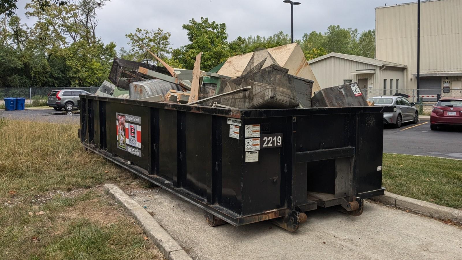 overfilled dumpster