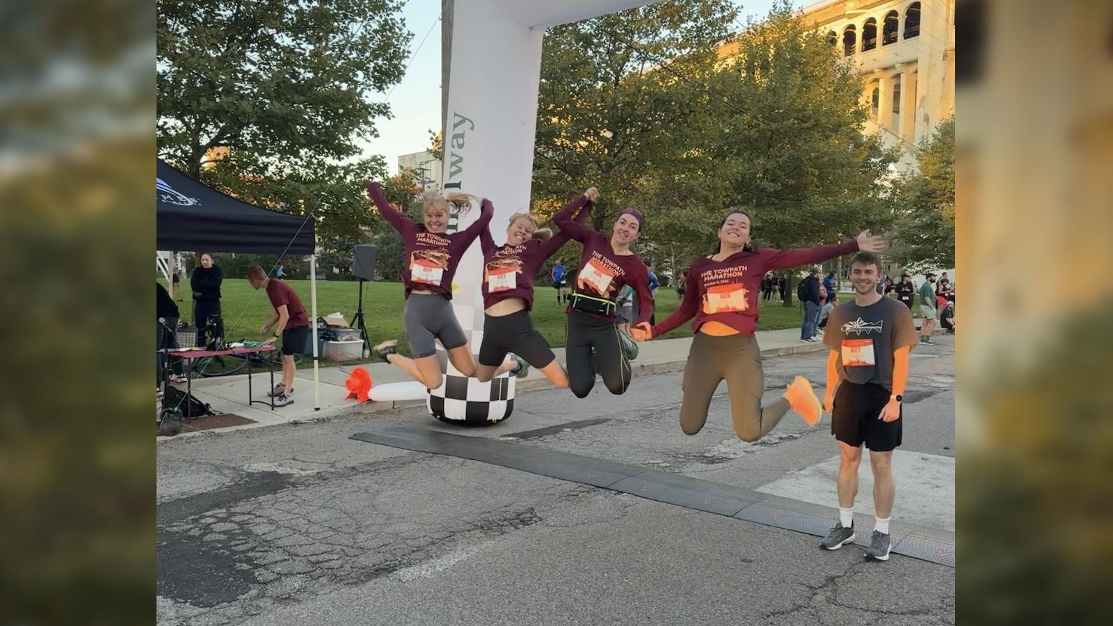 Megan, Sarah, Vanessa, Meredith and Justin celebrating after the race